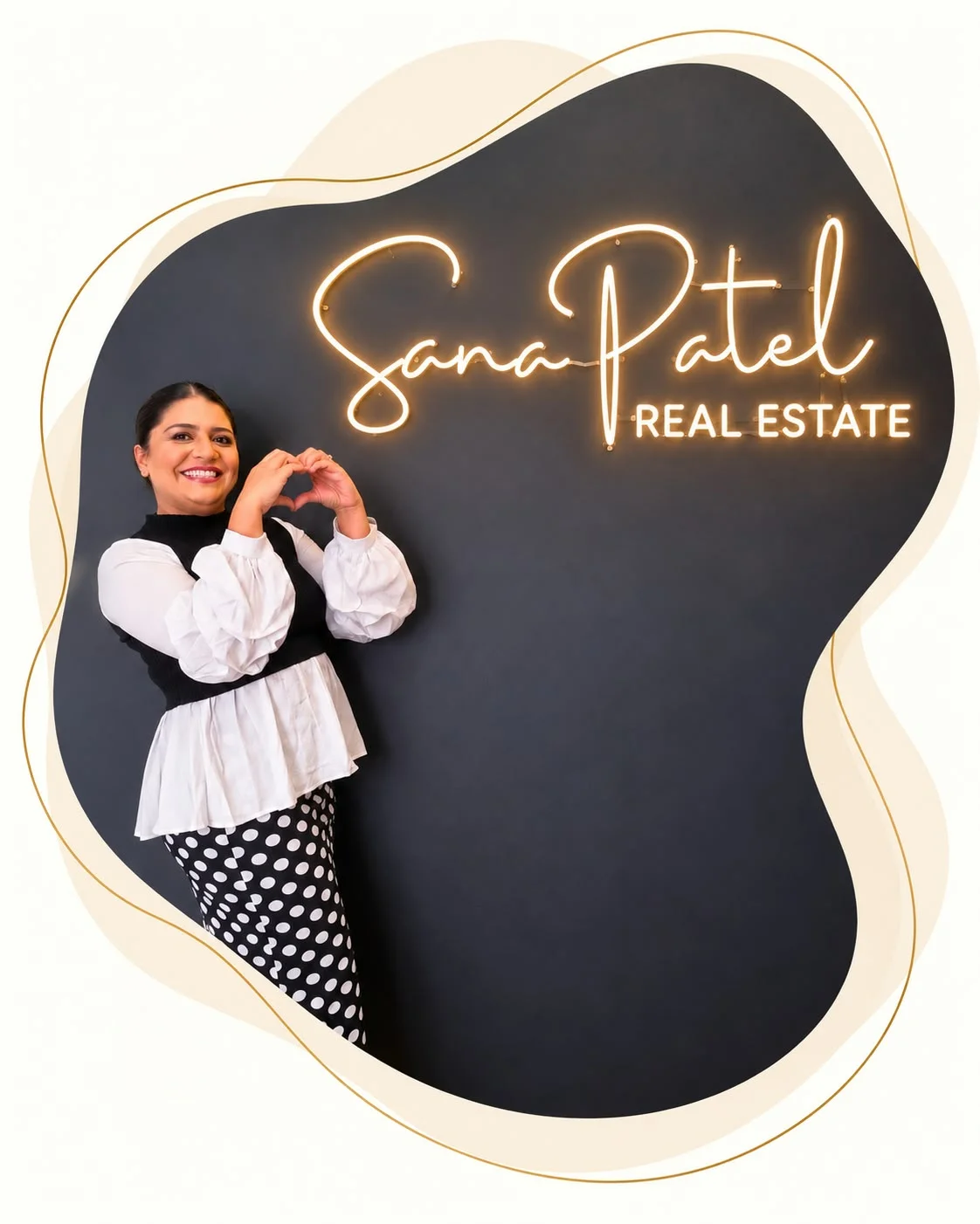 Sana Patel beside the Sana Patel Real Estate brand sign